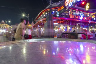 Neon lights, the legendary restaurant THE RED PIANO, Pub Street in the evening, entertainment