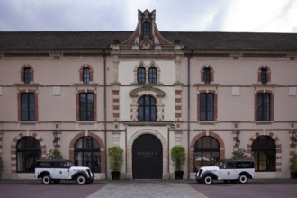 Black and white Renault Juvaquatre Editorial vintage cars in front of headquarters, head office,