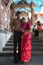 Indian wedding couple, 23 and 25 years old, at Sacchiya Mata Temple, Osian Temple Complex, Jodhpur,