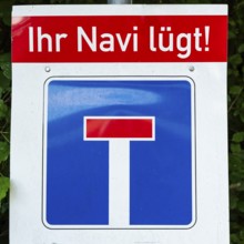 Sign with warning, incorrect guidance by sat nav, your sat nav is lying