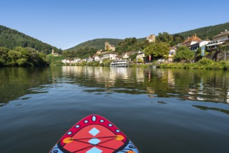 SUP board on the Neckar near Neckarsteinach. The ruins of Hinterburg Castle on the top left,