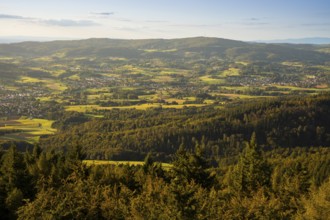 View of the Odenwald from the drum tower in Rimbach. Towns, forest, meadows, fields. Sunset.
