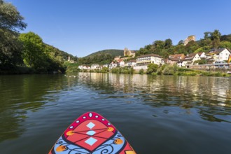 SUP board on the Neckar near Neckarsteinach. The ruins of Hinterburg Castle on the top left,