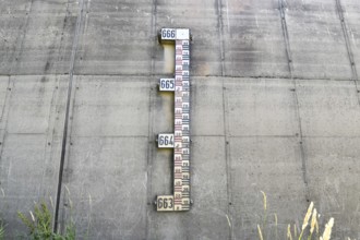Water level gauge on dam wall at Schwarzenbachtalsperre in the Black Forest region in Germany