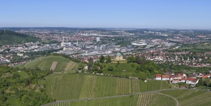 View of a cityscape with vineyards and hills under a blue sky, view of Rotenberg near Stuttgart