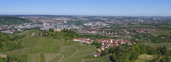 Expansive view of a city and its vineyards under a clear sky, view of Rotenberg near Stuttgart with