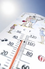 Worm's-eye view of thermometer measures extremely hot temperature of 40 degrees Celsius, 40 °C, 100