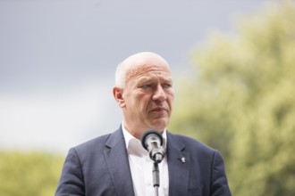Kai Wegner (Governing Mayor of Berlin) gives a speech in front of the raising of the rainbow flag