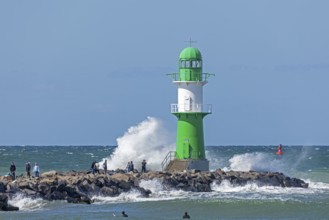 Waves, spray, people, beacon, Warnow estuary, Warnemünde, Rostock, Mecklenburg-Western Pomerania,