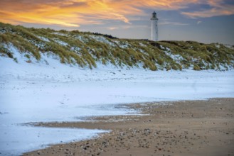 Lighthouse sunset in winter Fyred Hirthals Denmark