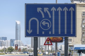 Signpost eight-lane Sheikh Rashid Bin Saeed Street, Abu Dhabi, United Arab Emirates