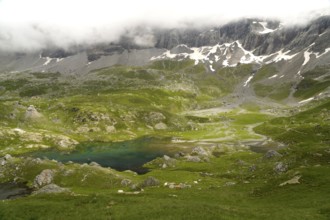 The Lacs des Aires lake in the Cirque de Troumouse basin in the Pyrenees National Park near