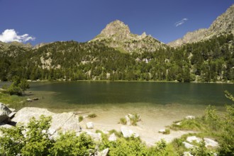 Lake Estany de Ratera in the Aigüestortes i Estany de Sant Maurici National Park, Catalonia, Spain