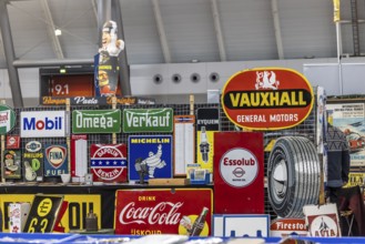 Historic enamel signs, collection of Vauxhall, Coca-Cola, Esso, Michelin and other brands from the