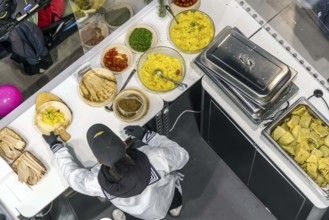 Maultaschen with potato salad. Caterer with Swabian regional dish during an event in Stuttgart,