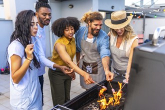 Cheerful friends grilling sausages on a rooftop, savoring the warmth of summer while enjoying a