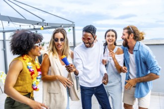 Diverse group of friends enjoying a lively karaoke session, singing, dancing, and celebrating