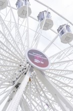 Close-up of a Ferris wheel with detailed construction and gondolas, Ferris wheel construction,