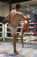 Thai boxing Muai Thai boxer in action, Pattaya, Thailand