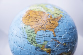 Puzzle globe. Map made from puzzle pieces. Gulf of Mexico