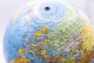 Puzzle globe. Map made from puzzle pieces