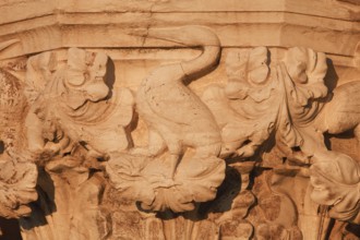Figurative representation on a capital of the Doge's Palace, Venice, Veneto, Italy