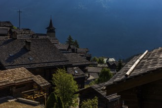 Shingle roofs at dawn, historic village centre, Grimentz, Val d'Anniviers, Valais Alps, Canton