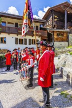 Pipers and drummers play in the historic village centre, Grimentz, Val d'Anniviers, Valais Alps,