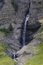 Waterfall cascading down a rock face, Zinal Valley, Val d'Anniviers, Valais Alps, Canton Valais,