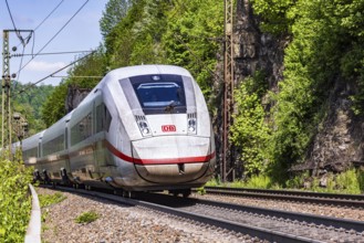 InterCityExpress ICE en route on the winding railway line of the Geislinger Steige. Landscape on