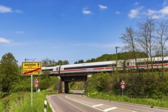 InterCityExpress ICE en route on the Swabian Alb near Lonsee. Landscape with railway bridge near