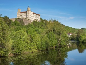 Willibaldsburg Castle is reflected in the River Altmühl, Altmühltal, Eichstätt, Upper Bavaria,
