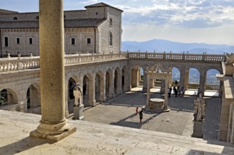 Bramante cloister with cistern and statues of St Benedict and St Scholastica of Nursia, Benedictine