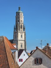 View from the medieval town wall over the houses of the historic old town to the tower of St