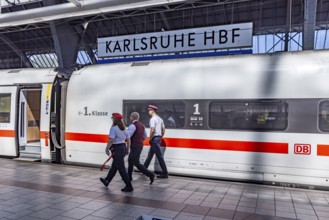 Karlsruhe main station with ICE and employees of Deutsche Bahn AG. Karlsruhe, Baden-Württemberg,