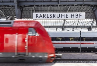 Karlsruhe main station with station sign and ICE. Karlsruhe, Baden-Württemberg, Germany