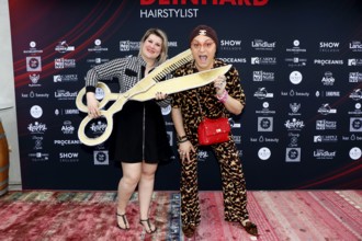 Janine Becker and Julian F. M. Stöckel at the VIP opening of the new Deinhard Salon Am Mühlanger 3,