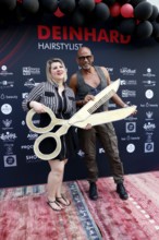 Janine Becker (owner) and Pierre Sanoussi-Bliss at the VIP opening of the new Deinhard Salon Am