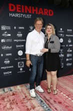 Arno Funke and Janine Becker at the VIP opening of the new Deinhard Salon Am Mühlanger 3, Berlin,