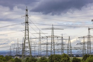 Many high-voltage power lines and lattice towers in the district of Ludwigsburg near Besigheim,