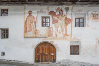 Religious frescoes on a historic farmhouse from 1602, Bahnstraße, Telfes im Stubai, Austria the