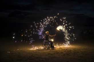 Fire show, jugglers with fire, wheelchair users, Ao Nang Beach, sunset, Ao Nang, Krabi, Thailand
