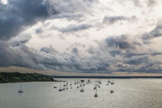 Sunset of Yachts over Ramshorn Lake and Brownsea, Poole, Dorset, England, United Kingdom