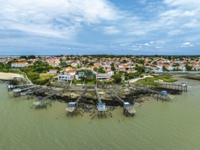 Fishing huts over Randonnee entre Histoire et Nature from a drone, Fouras, Fouras-les-Bains,