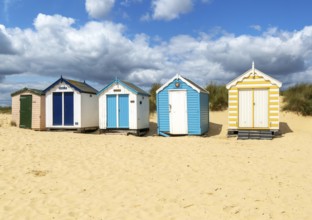 Seaside beach huts on the seafront at Southwold, Suffolk, England, UK