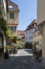 Die Webergasse in der historischen Altstadt von Esslingen mit historischen Fachwerkhäusern,