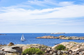 Archipelago with sailing boats off the coast of Lysekil, Bohuslän, Västra Götalands län, Sweden,