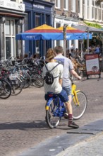 Cycling in the Netherlands, Utrecht, typical riding style with 2 people on one bike