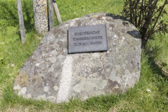 Signpost European watershed Danube and Rhine near the source of the Danube in Furtwangen in the