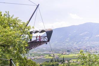 Two people on a platform with a wide view over the valley and mountains, Botanical Gardens, The